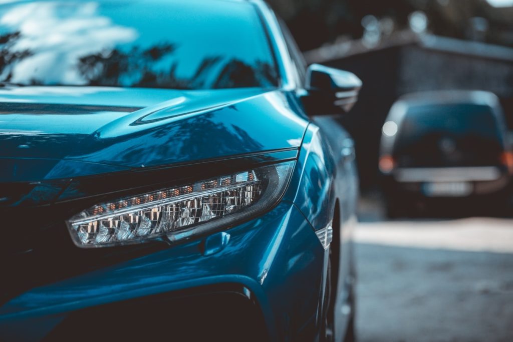 Close up of headlight on a detailed luxury vehicle