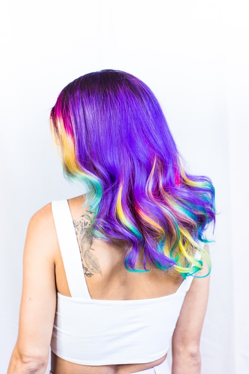 Bright, colorful hair design done by hairdresser