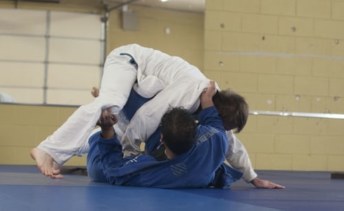 Judo instructor sparring with a partner