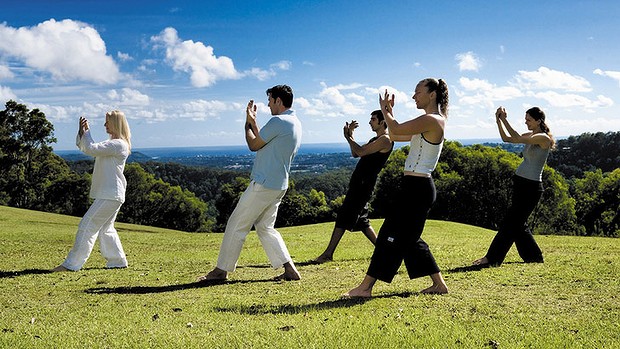 Tai Chi class training on a hilltop