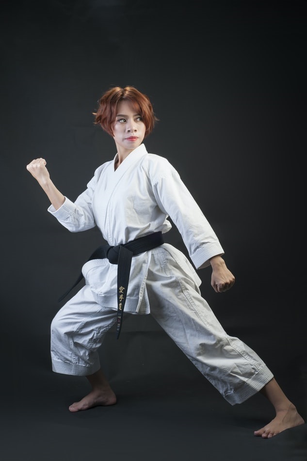 Karate instructor posing in a blocking stance