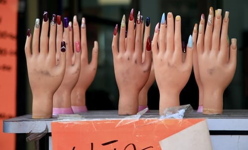 Mannequin hands with different colored and shaped fingernails