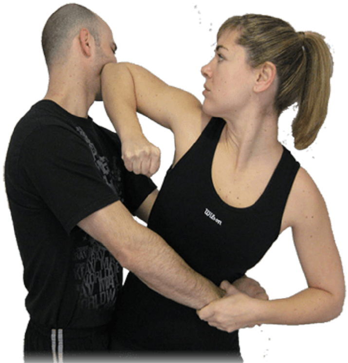 Female demonstrating self defense moves against a male attacker