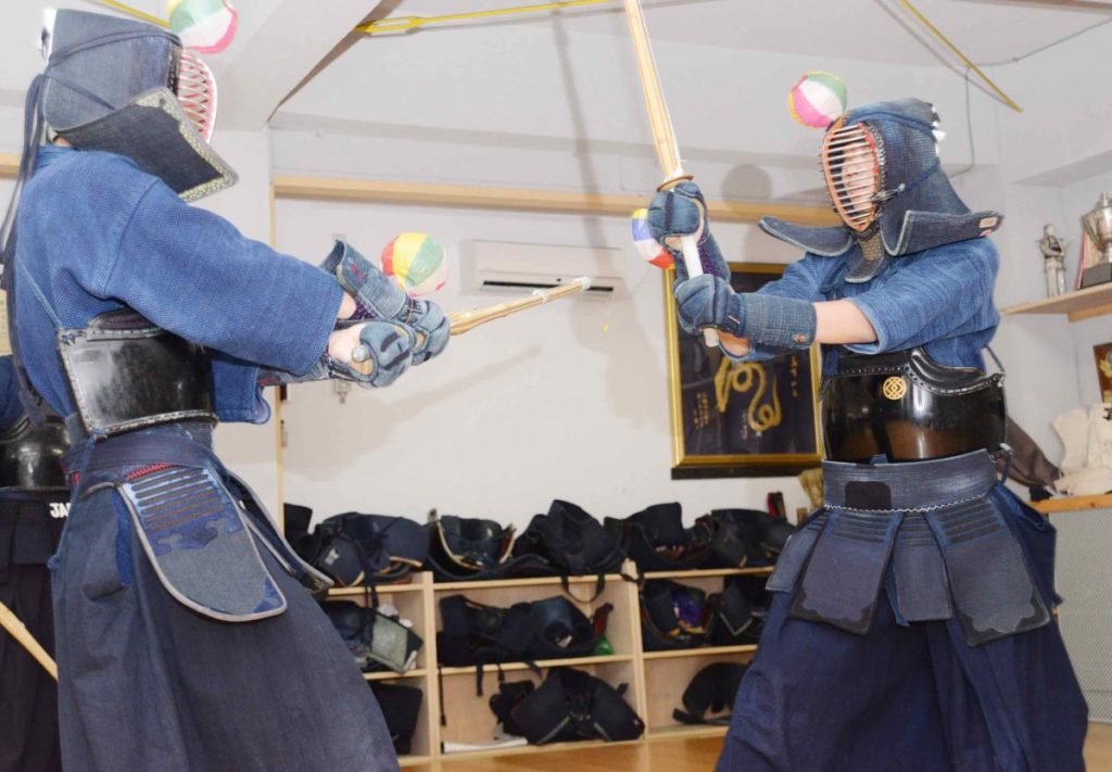 Kendo fighters practicing together